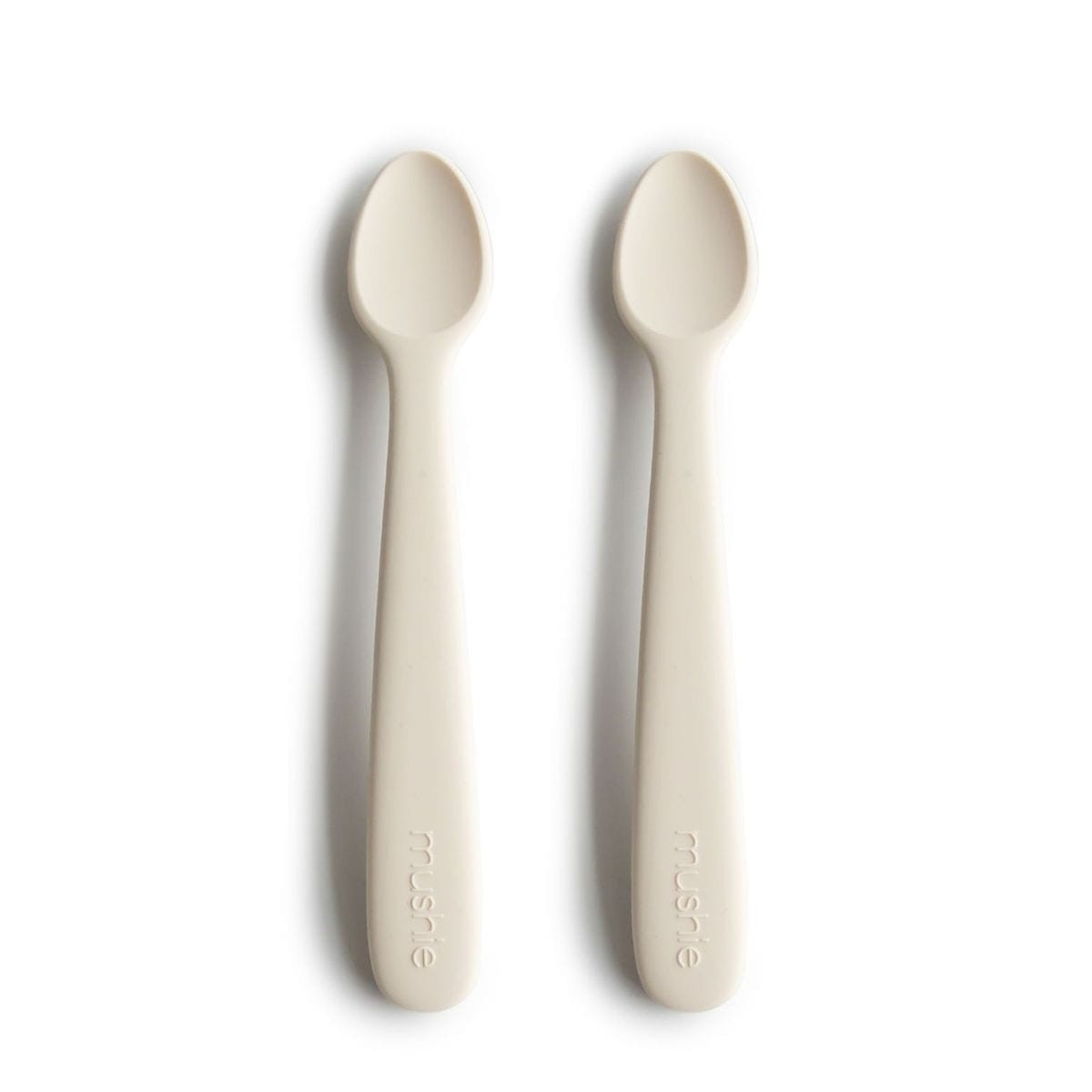 Siliconen baby lepels Mushie Ivory set van 2